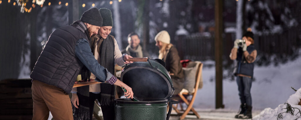 Group enjoying Big Green Egg Grilling in Winter